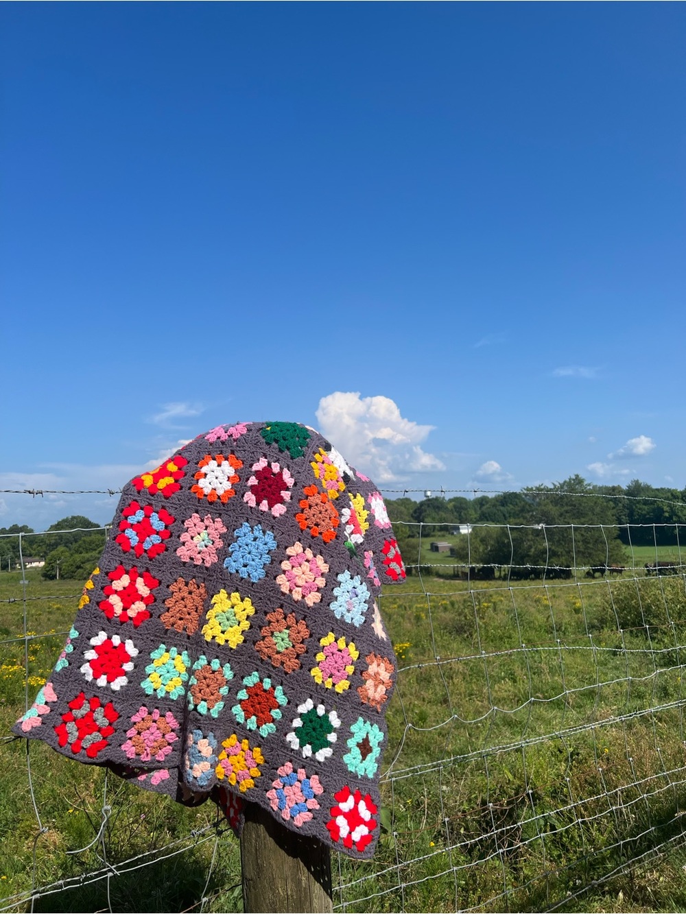 Handmade Multicolor Granny Square Crochet Blanket - Gray Background